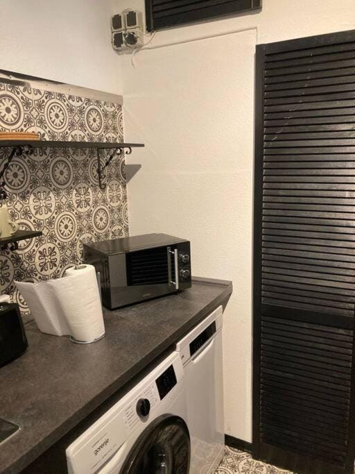 Kitchen or kitchenette, stove