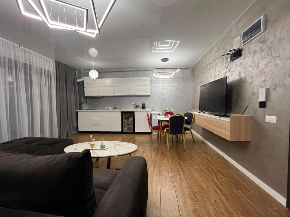 TV and multimedia, Kitchen or kitchenette, Living room, Seating area, Dining area, air conditioner