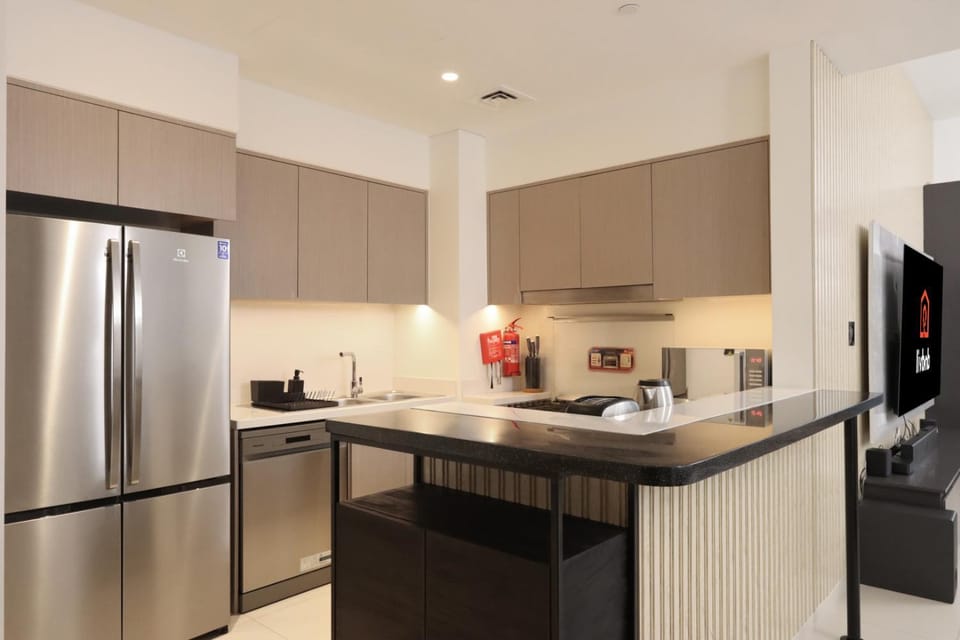 Kitchen or kitchenette, dishwasher, oven, stove, toaster