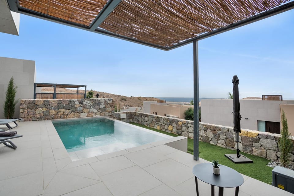 Property building, Living room, Swimming pool