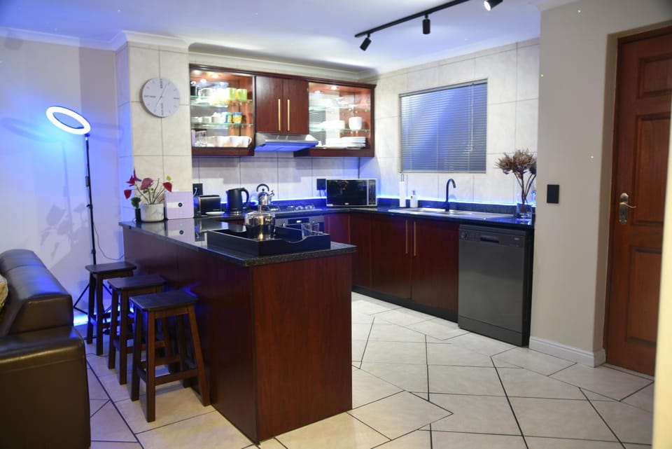 Kitchen or kitchenette, dishwasher, oven, stove, washing machine, dryer