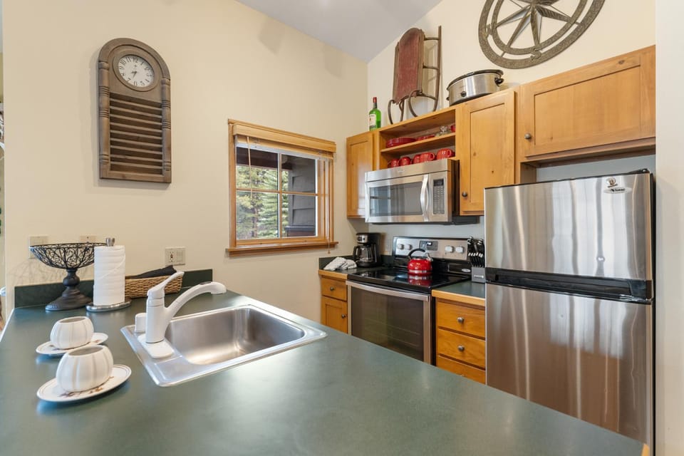 Kitchen or kitchenette, furniture, microwave, kitchen