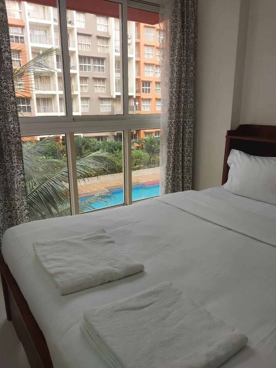 Bed, Bedroom, Pool view, Swimming pool, towels