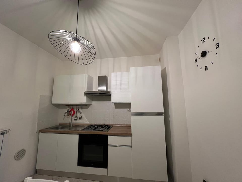 Kitchen or kitchenette, oven, stove