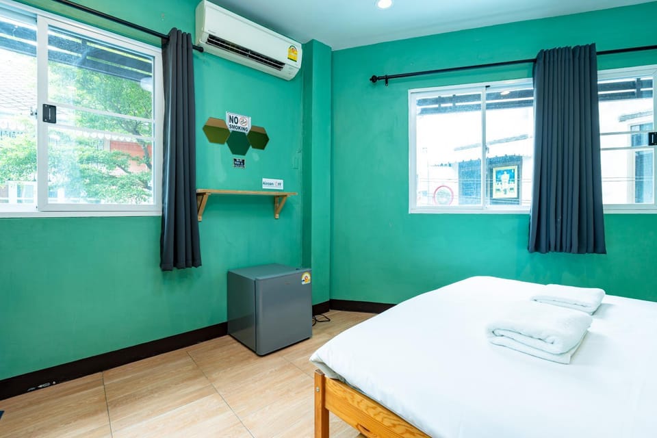 Bed, Photo of the whole room, Bedroom, towels, air conditioner