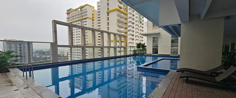 Makati Bliss Apartment - Cozy Urban Retreat Apartment in Pasay