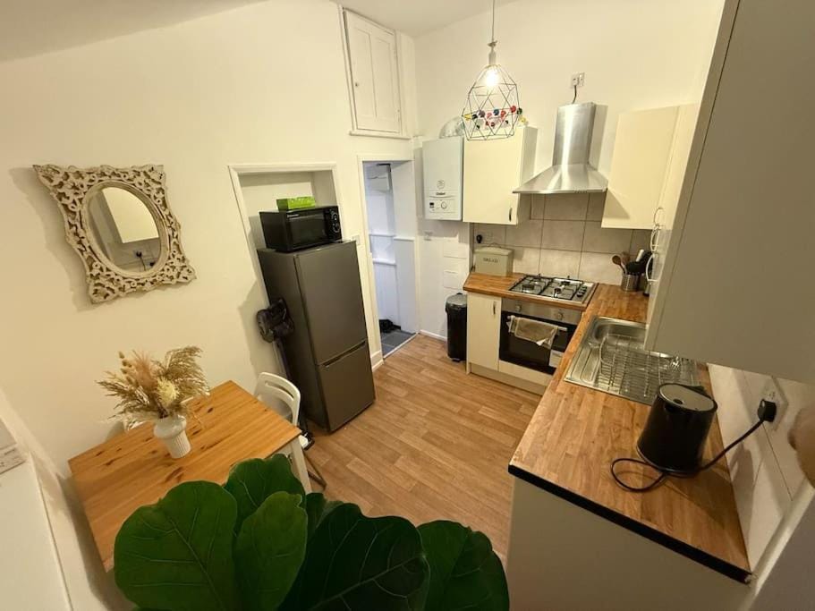 Kitchen or kitchenette, Dining area, dishwasher, oven, stove, toaster