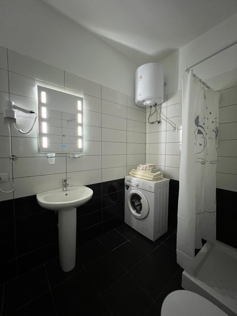 Shower, Toilet, Bathroom, towels, washing machine, dryer