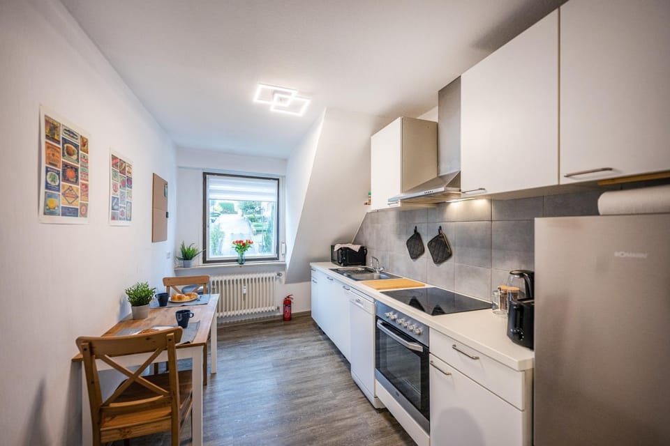 Kitchen or kitchenette, Dining area, dishwasher, oven, stove, toaster
