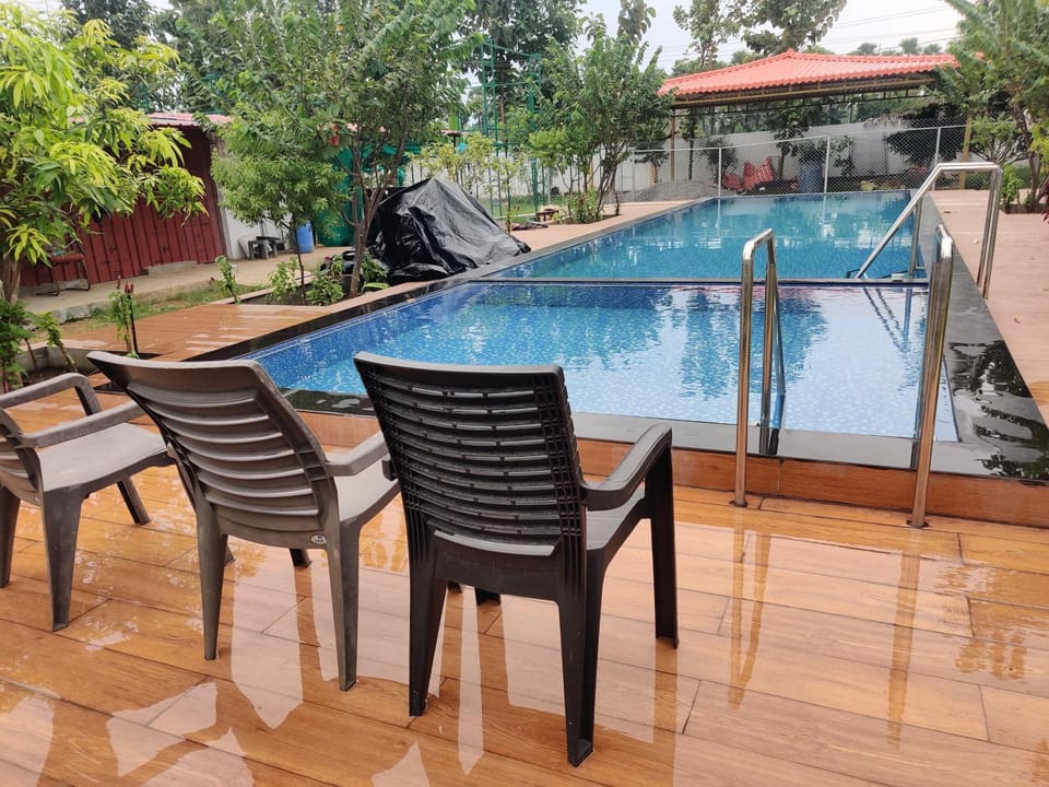 Sivarama garden resort AC 4 Bed rooms, swimming pool 4BHK room , Box cricket, open living hall, BOrn fair, BBQ, kichan with equipment , near beach road, vishakhapatnam Apartment in Visakhapatnam