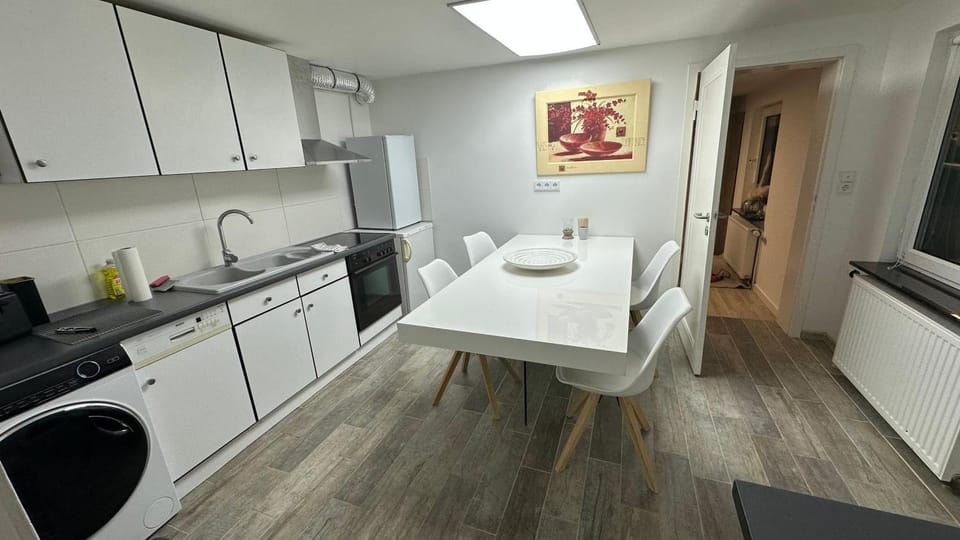Kitchen or kitchenette, Dining area, dishwasher, oven, stove, toaster, washing machine, dryer