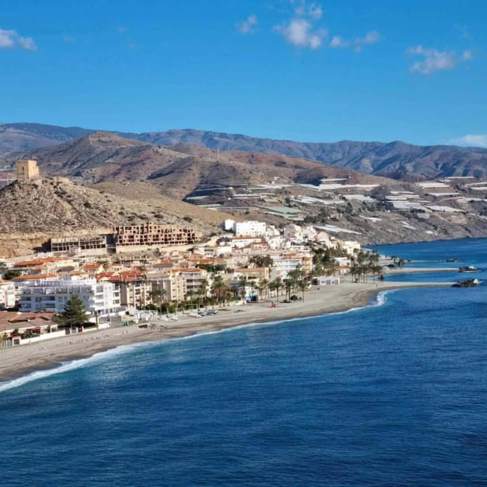 Nearby landmark, Natural landscape, Beach, City view, Mountain view