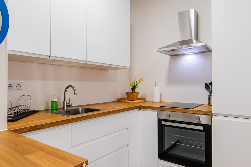 Kitchen or kitchenette, dishwasher, internet, oven, stove, kitchen