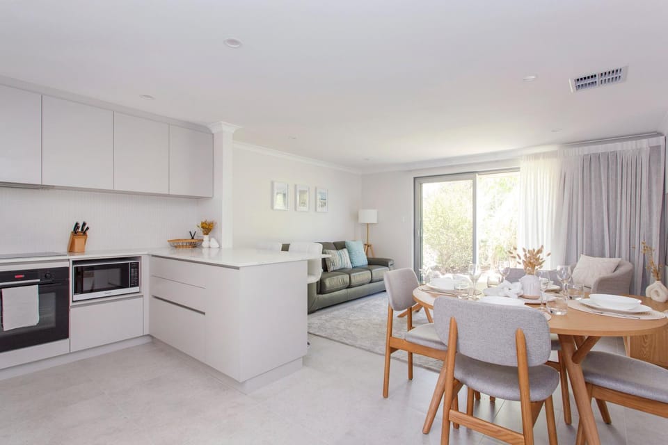 Kitchen or kitchenette, Living room, Seating area, Dining area, dishwasher, oven, stove, toaster