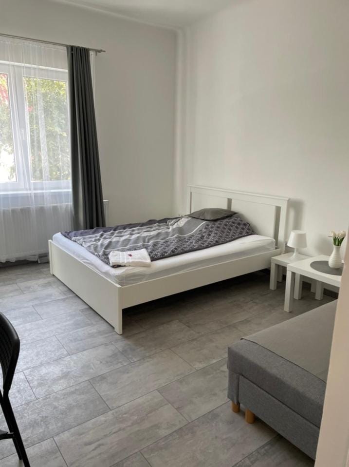 Communal lounge/ TV room, Bed, Seating area, Bedroom