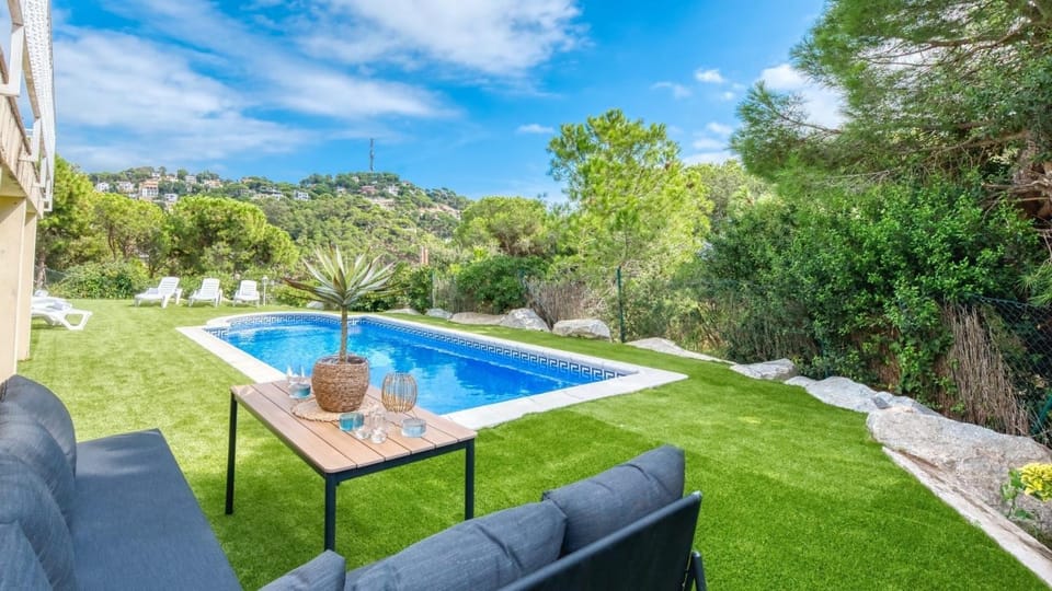 Property building, Living room, Swimming pool