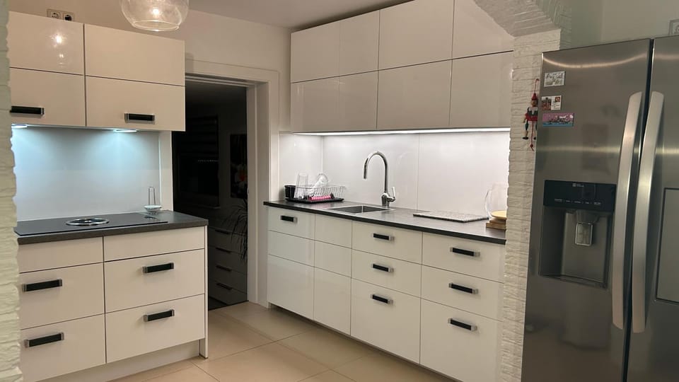 Kitchen or kitchenette, stove, kitchen