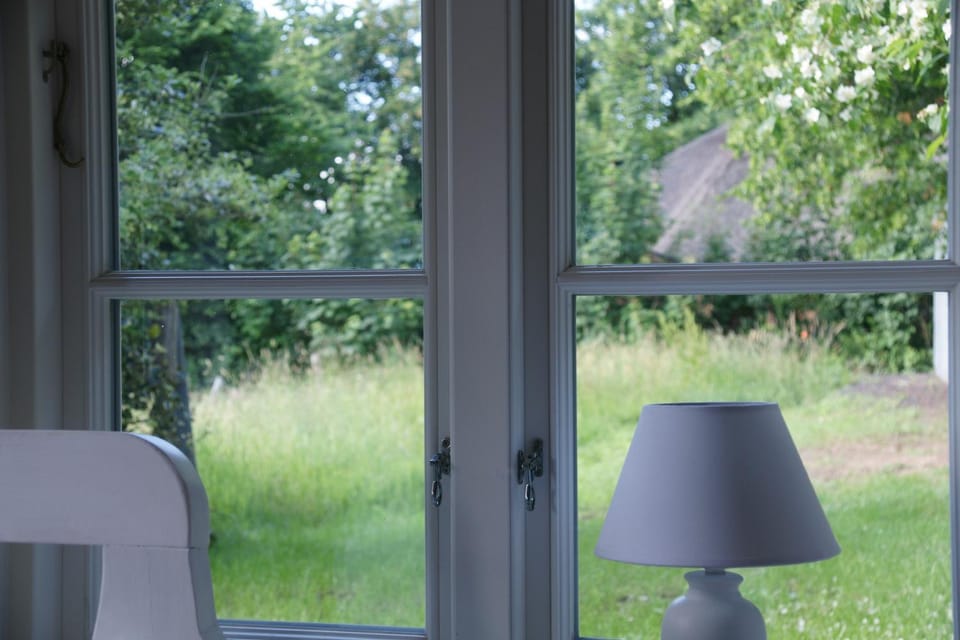 Kate unter Reet im Grünen House in Schleswig-Holstein