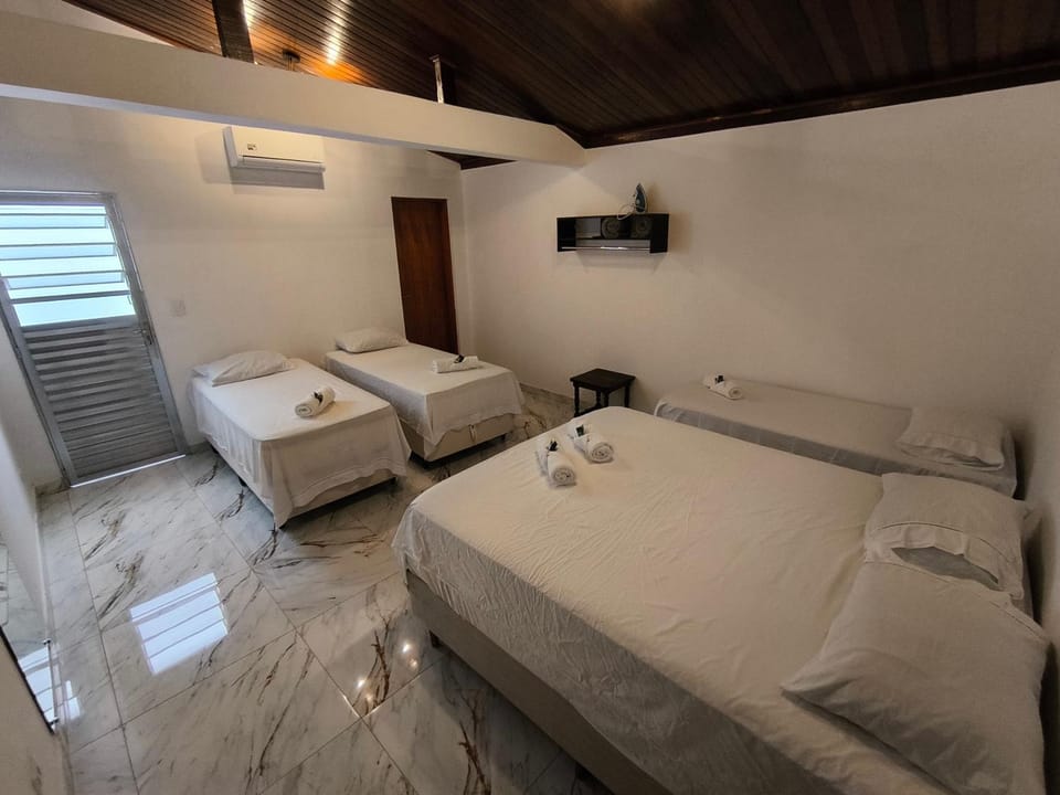Bed, Photo of the whole room, Bedroom, towels, air conditioner