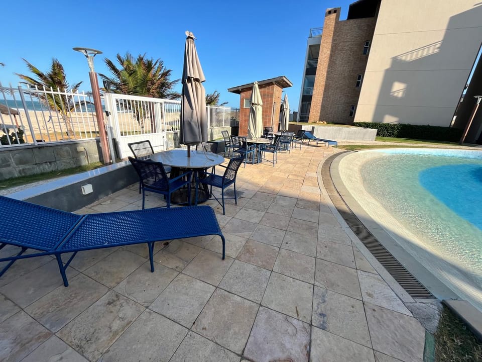 Swimming pool, sunbed