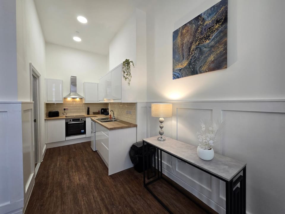 Kitchen or kitchenette, oven, stove, toaster