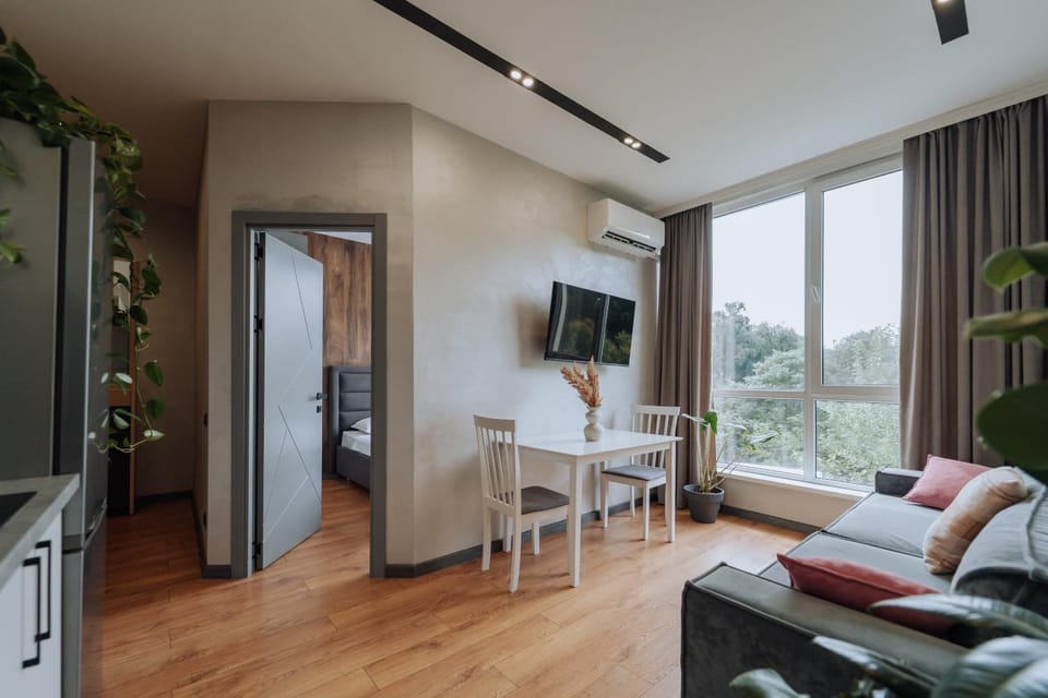 TV and multimedia, View (from property/room), Living room, Seating area, Dining area, air conditioner