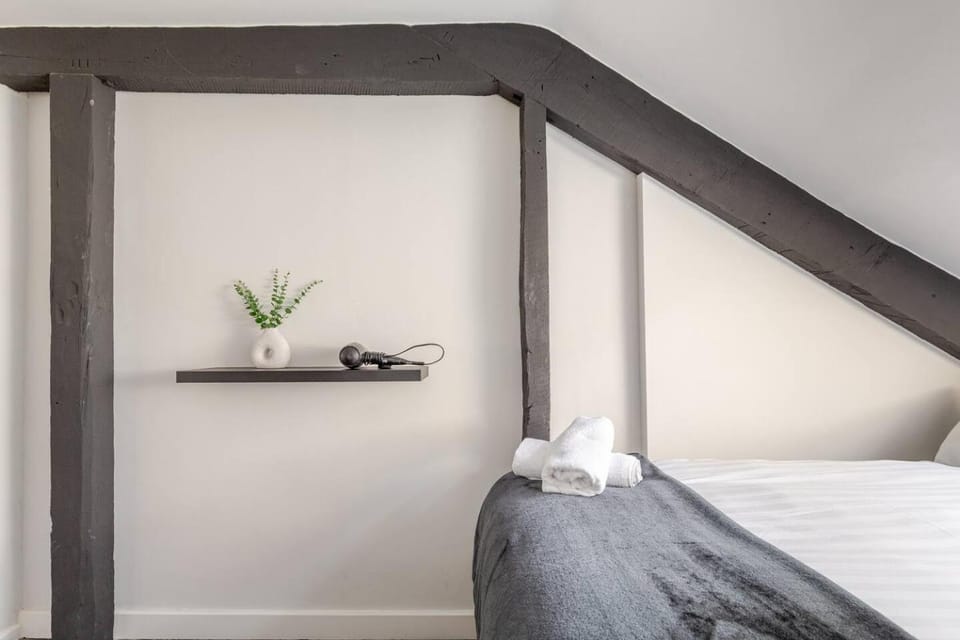 Bed, Decorative detail, Bedroom, hair dryier, towels