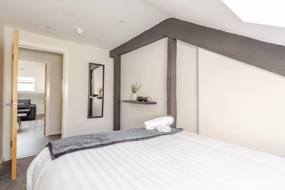 Bed, Decorative detail, Bedroom, hair dryier, towels