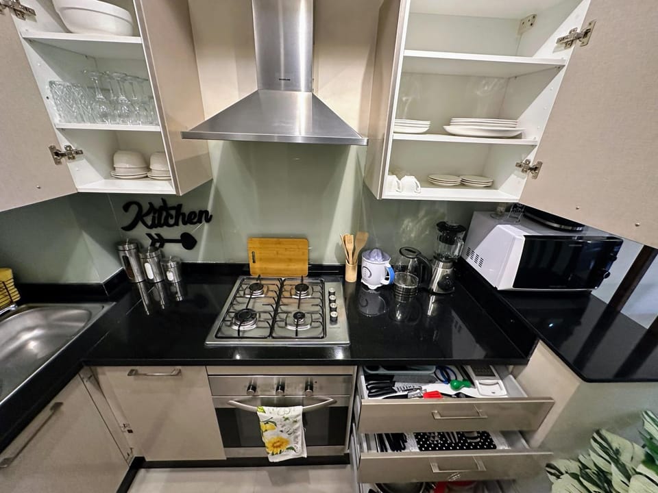 Kitchen or kitchenette, oven, stove, toaster