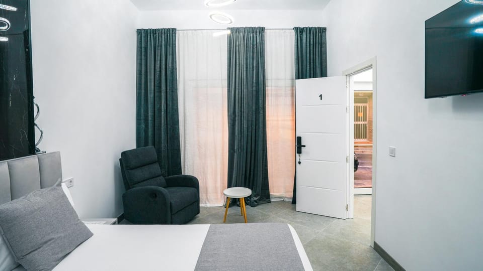 Bed, Seating area, Bedroom