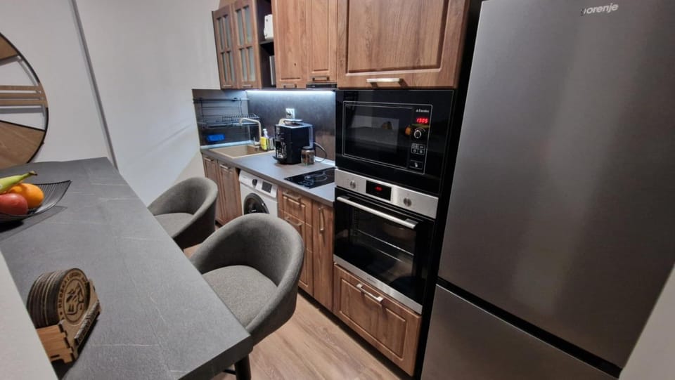 Kitchen or kitchenette, oven, stove