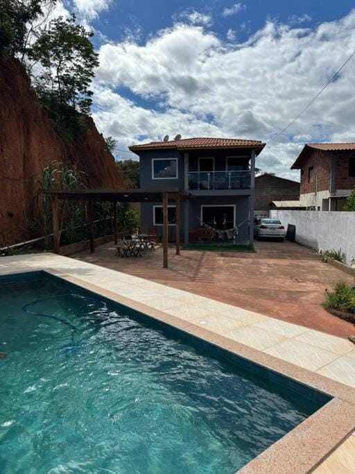 Property building, Natural landscape, Pool view, Swimming pool, Parking