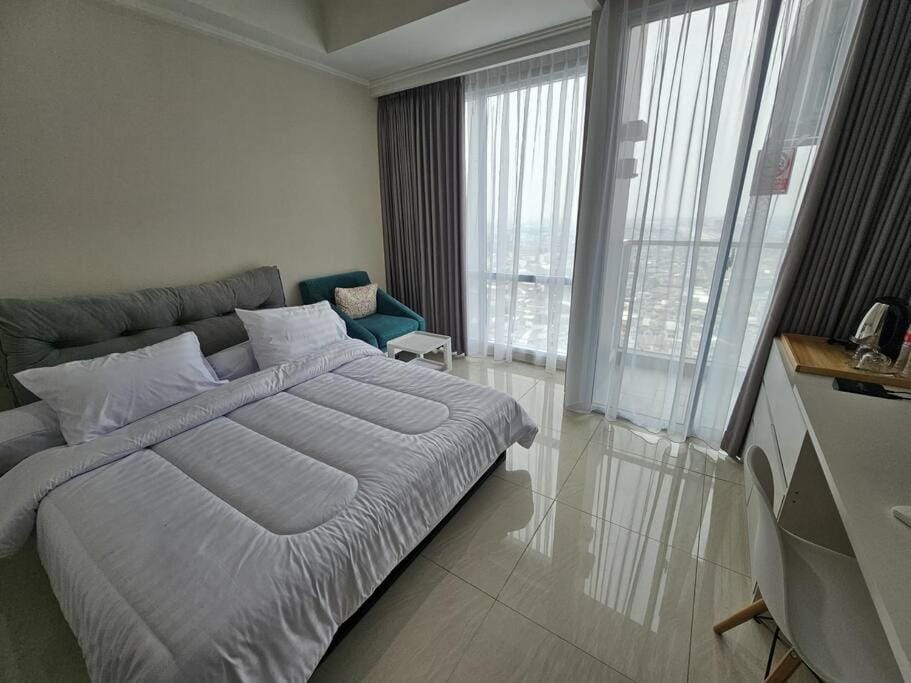 Green Sedayu Apartment Deluxe by Ellison Apartment in Jakarta