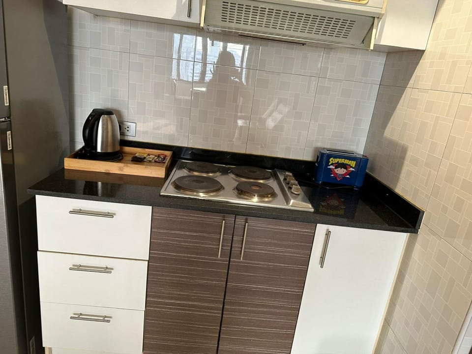 Kitchen or kitchenette, stove
