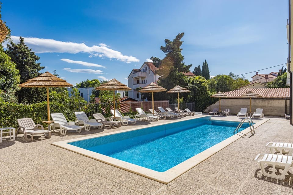 Patio, Day, Pool view, Swimming pool, Swimming pool, sunbed