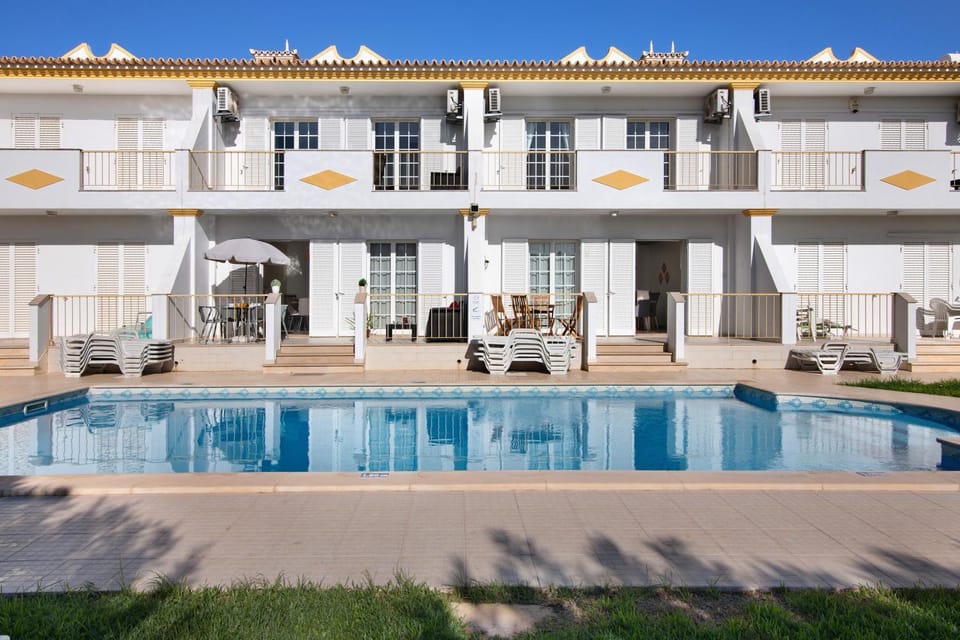Property building, Living room, Swimming pool