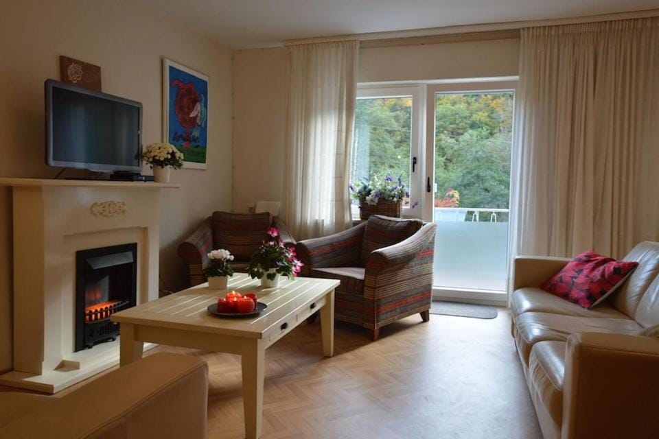 Communal lounge/ TV room, TV and multimedia, View (from property/room), Living room, Seating area, Evening entertainment, Garden view, Garden view, Mountain view, Mountain view, fireplace