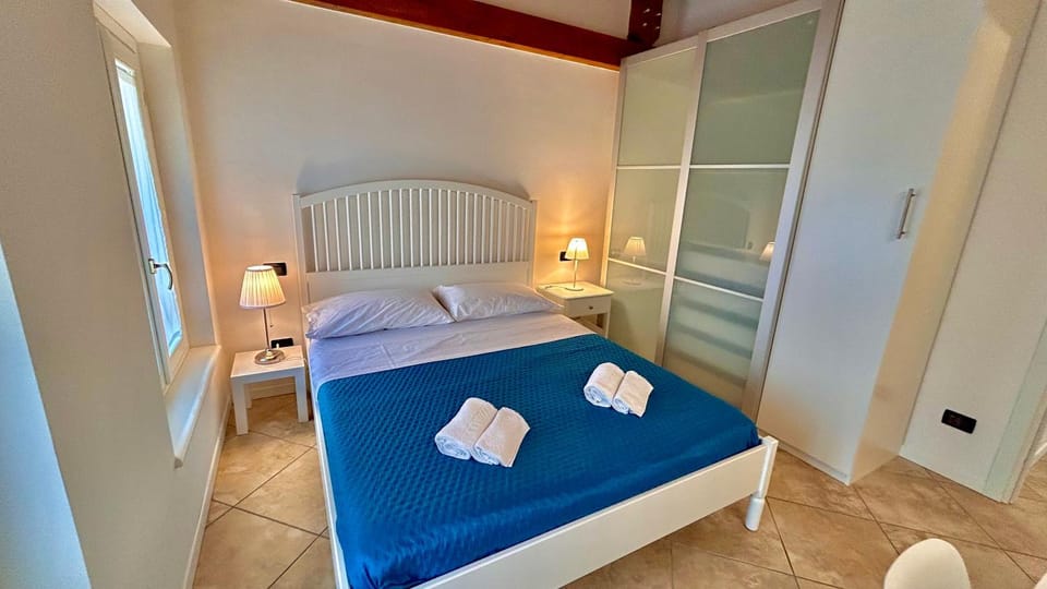 Bed, Photo of the whole room, Bedroom, towels, wardrobe