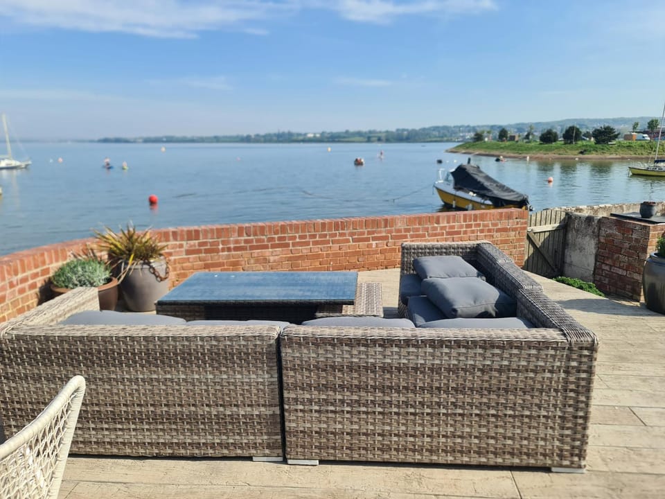 Patio, View (from property/room), Seating area, River view