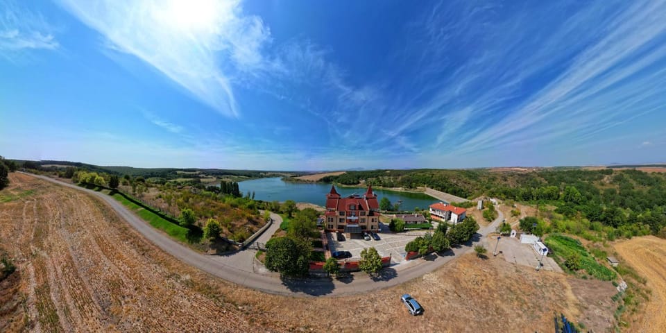 Property building, Natural landscape, Bird's eye view, River view, Time of day