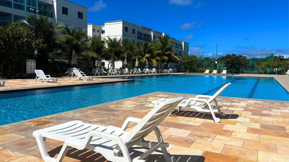Palm Village Acqua - Flats em Muro Alto por Yolo House in Ipojuca