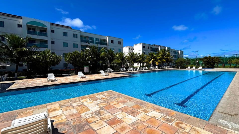 Palm Village Acqua - Flats em Muro Alto por Yolo House in Ipojuca