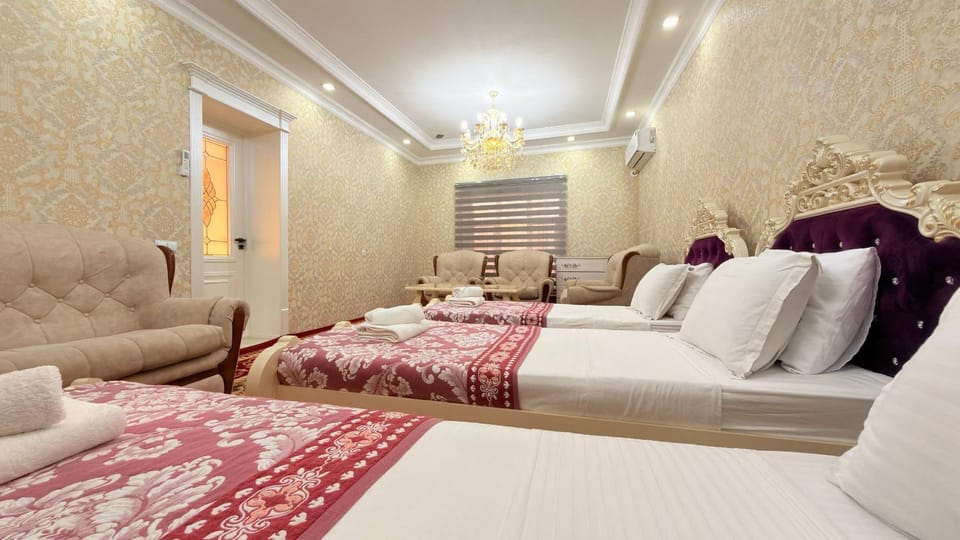 Bed, Living room, Seating area, Bedroom