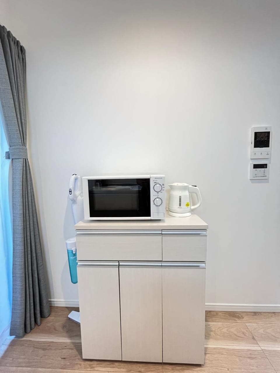 Kitchen or kitchenette, microwave