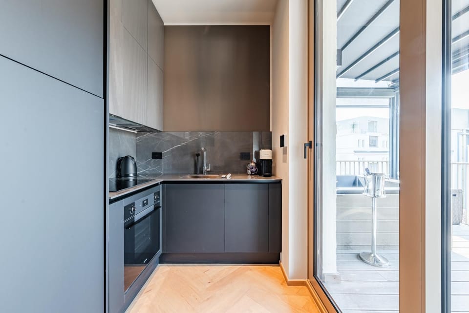 Kitchen or kitchenette, oven, stove