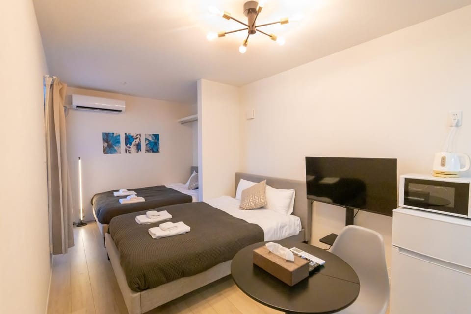 Bed, TV and multimedia, air conditioner