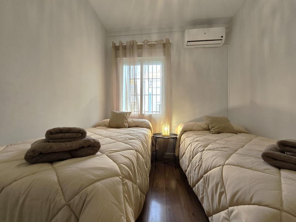 Bed, Decorative detail, Bedroom, heating, towels, air conditioner