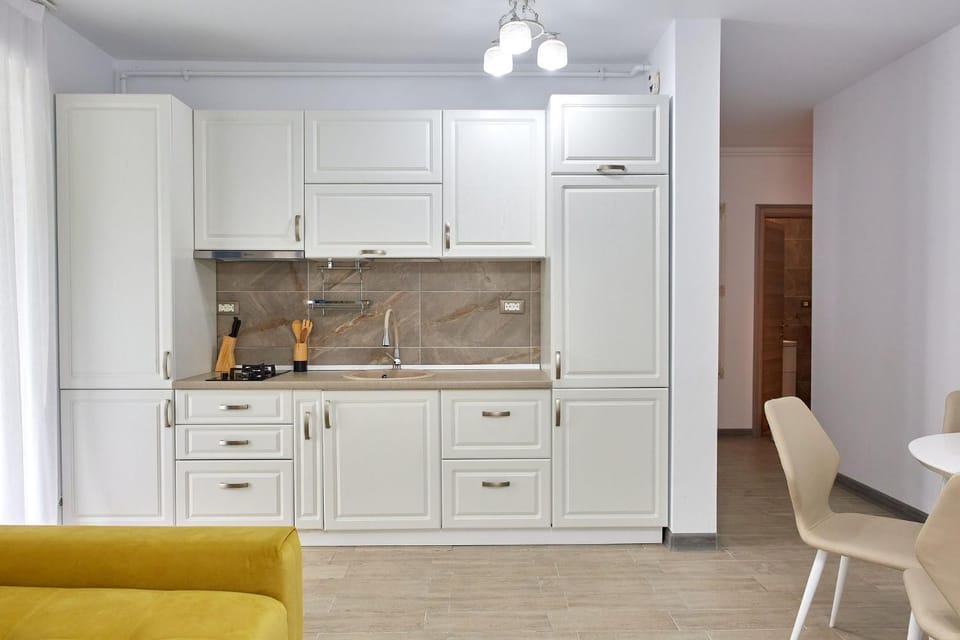 Kitchen or kitchenette, Living room, Seating area, Dining area