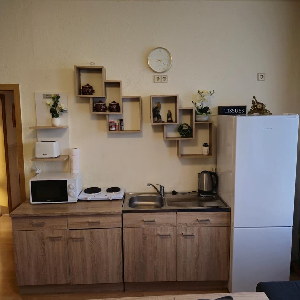 Kitchen or kitchenette, microwave, oven, stove, kitchen