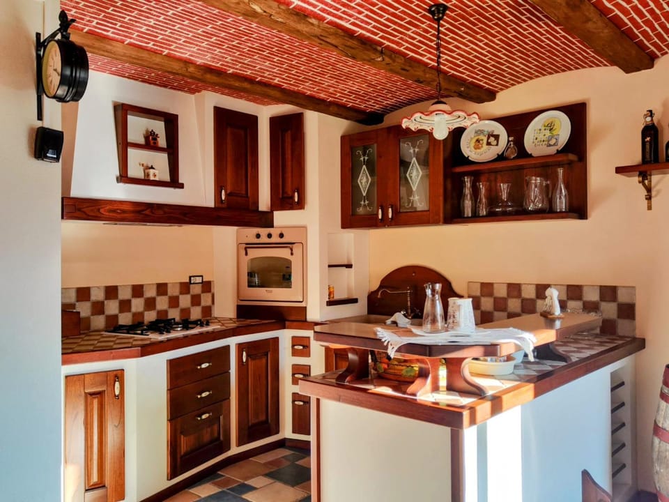 Kitchen or kitchenette, oven, stove